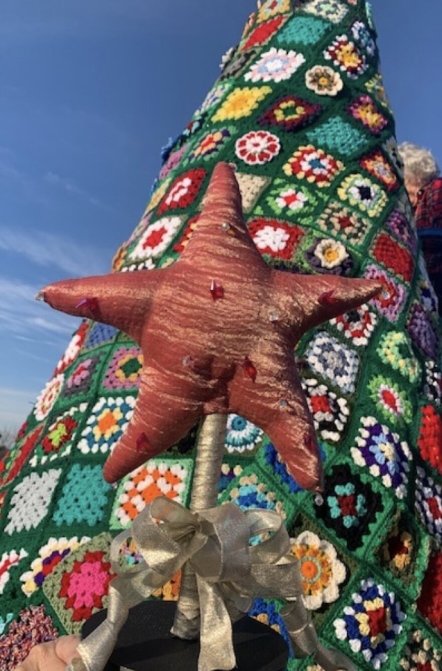As the crocheted holiday tree takes shape, a special star is ready to be put on top.