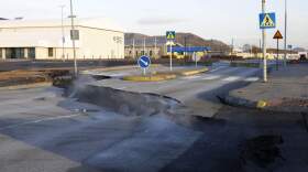 Steam rises from a fissure in a road near the town of Grindavik, Iceland Monday Nov. 13, 2023 following seismic activity. Residents of Grindavik, a town in southwestern Iceland, have been briefly allowed to return to their homes on Monday after being told to evacuate on Saturday after increasing concern about a potential volcanic eruption caused civil defense authorities to declare a state of emergency in the region. (Brynjar Gunnarsson/AP)