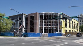 Santa Fe College's Blount Center expansion project construction on the corner of West University Avenue and Northwest 6th Street in Gainesville on Wednesday, April 7, 2021. The construction is on track to be fully completed by the college's next winter break. (Julia Coin/WUFT News)