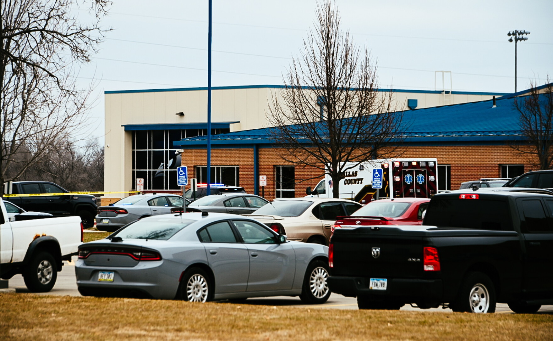 Perry High School principal injured in shooting dies | Iowa Public Radio