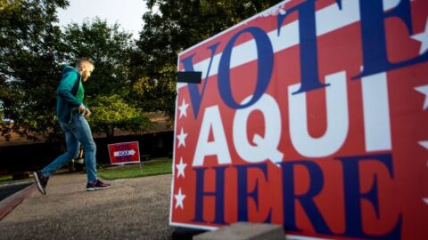 A voter heads to a polling site at Faith Presbyterian Church in the Travis Heights neighborhood of Austin on Election Day.
