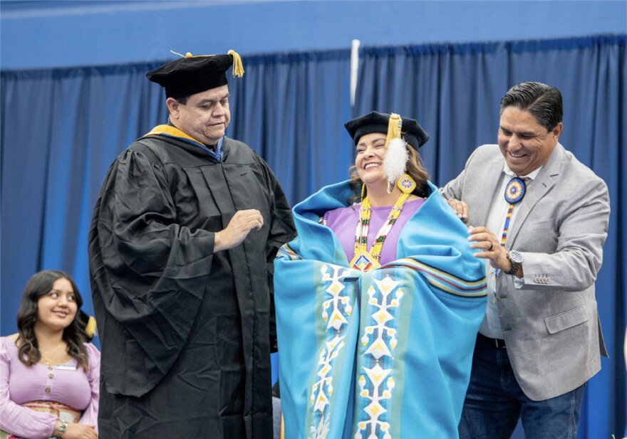 The ceremony featured the gifting of a blanket and beaded pin by Ernest House, Senior Policy Director at Keystone Policy Institute and Ute Mountain Ute Tribal Member, and Adam Red of the FLC Board of Trustees.
