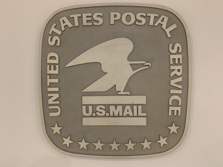 A U.S. Postal Service sign