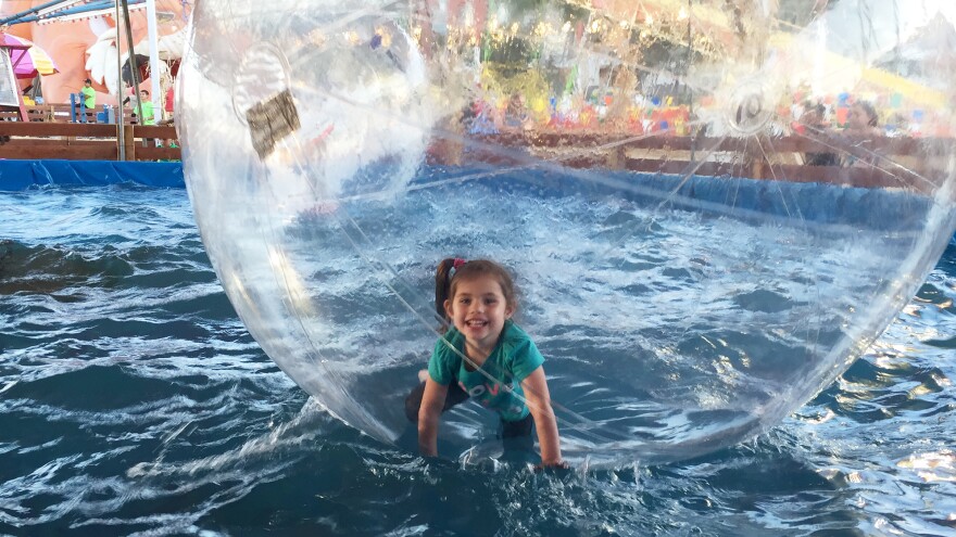 Evangelina Padilla-Vaccaro, now cured of a serious genetic illness — thanks to a successful stem cell treatment — playing recently in a public park. The bubble around her is just for fun.