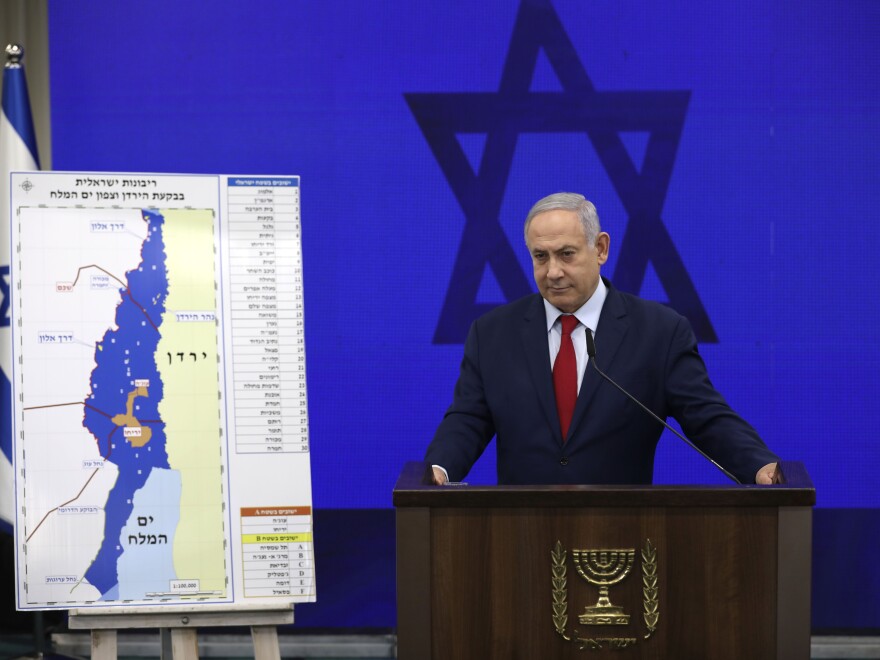 Netanyahu tells reporters on Sept. 10 in Tel Aviv that he will annex West Bank settlements if he wins the national elections.