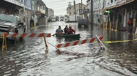 Paddlers navigate the flooded Custom House Wharf in Portland on Saturday, Jan. 13, 2024. This image is openly licensed via CC BY-SA 4.0.