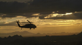 A Customs and Border Protection UH60A "BlackHawk" helicopter departs Davis-Monthan Air Force Base on a night patrol March 13, 2005 in Tuscon, Arizona.