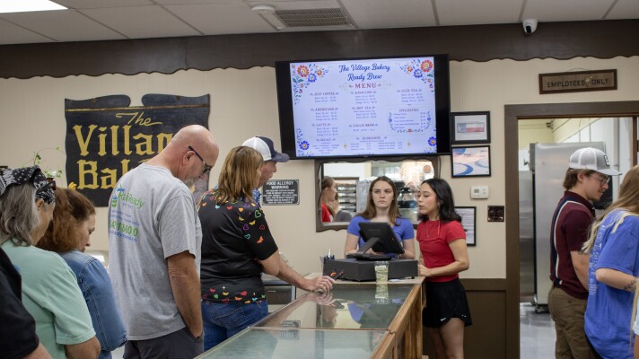 Customers wait in line at the Village Bakery in West, Texas during their grand reopening on May 23, 2026. The bakery, known for its kolaches, closed in 2019 following the death of owner Mimi Montgomery Irwin.