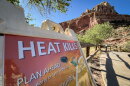 A sign warns visitors of extreme heat’s health risks at Capitol Reef National Park, June 28, 2026. Capitol Reef was one of several national parks or monuments in Utah that experienced their warmest summer on record this year.