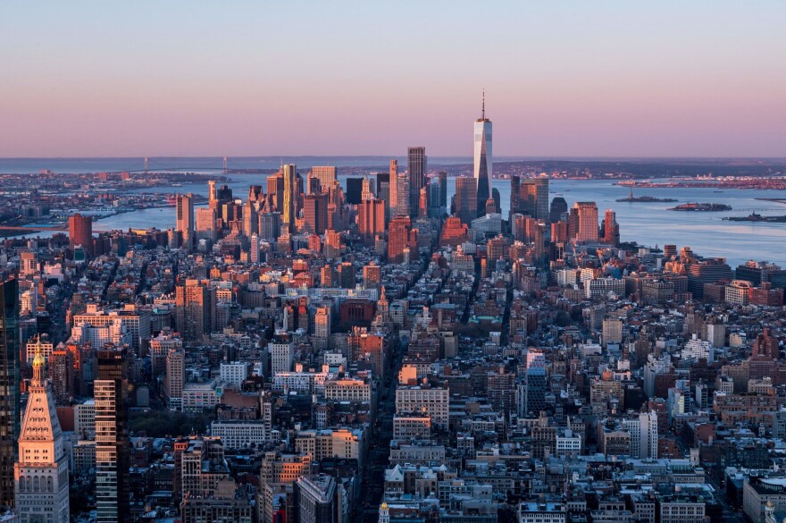 The Manhattan skyline is seen at sunrise from the 86th floor observatory of the Empire State Building on April 3, 2021, in New York City. (Angela Weiss/AFP via Getty Images)