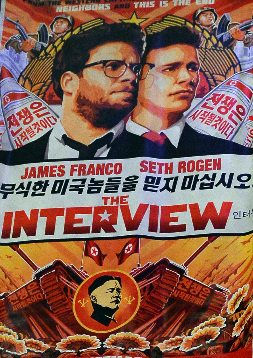 A poster for <em>The Interview</em>. Some theaters now say they will show the comedy, which Sony Pictures had pulled following threats.