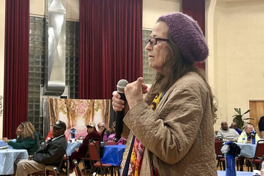 Flint resident Carroll Kinkade asks about where residents can stay up to date about the city's water quality during the May 20 celebration. Kinkade later said she felt that activists could do a better job of engaging with local residents.