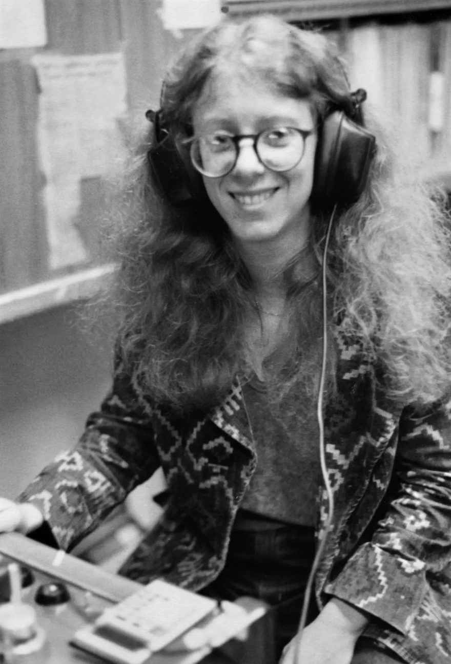 A young Terry Gross with headphones.