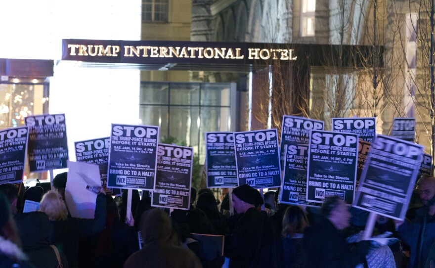 Demonstrators protest outside the Trump International Hotel in Washington, D.C., on Jan. 15.