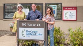 Representatives from the Cancer Wellness Center of NEPA prepare for the organization's annual walk. From left: Amy Andrejko, co-chair; Tom Ruskey, Cancer Wellness Center director; and Emily Courtois, co-chair.