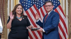 Speaker of the House Mike Johnson, R-La., holds a ceremonial swearing-in for Rep. Adelita Grijalva, D-Ariz., left, at the Capitol in Washington, Wednesday, Nov. 12, 2025.
