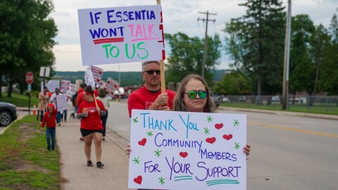 Advanced practice providers picket outside Essentia Health-Virginia on the first day of their strike, July 10, 2025.