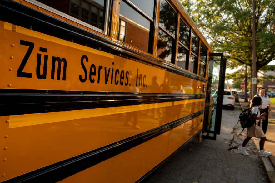 A school bus drives drops students off outside of Stevens Middle School on Monday, Aug. 18, 2025, in St. Louis’ Vandeventer neighborhood.