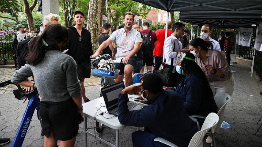 People line up outside of the New York City Department of Health and Mental Hygiene on June 23, as the city makes vaccines available to residents possibly exposed to monkeypox.