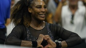 Serena Williams, of the United States, makes a heart with her hands after defeating Danka Kovinic, of Montenegro, during the first round of the US Open tennis championships, Monday, Aug. 29, 2022, in New York.