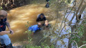 City workers in Trinity, Texas worked to restore services after days of flooding