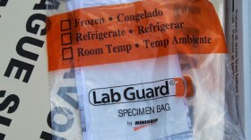 A bag of Covid-19 testing supplies