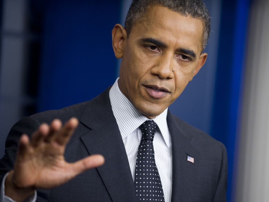 President Obama answers questions at the White House on Aug. 20.