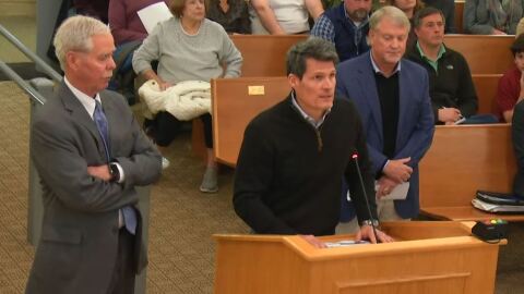 Michael Mays, president of Greenbrier Senior Living, joined by Frye Properties, Inc. representative Vernon Geddy (left), Pembroke Realty Group President Ramsey Smith (right) present to the James City County Board of Supervisors about the Ford's Village project.