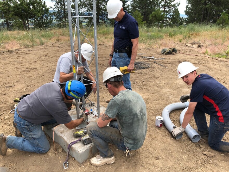 Engineers working on tower