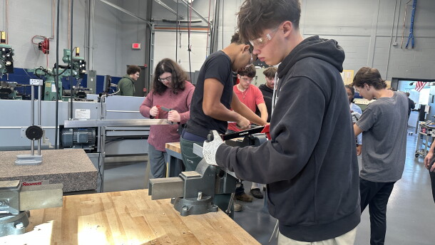 Fairmont High School students in the advanced manufacturing class. Juniors are learning how to work with an aluminum rod in the Career Tech Center on campus.