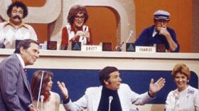 The participants on an early episode ofÂ <em>Match Game</em>, including Richard Dawson in the lower center position.