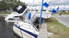 Boats destroyed during Hurricane Helene are shown on the Davis Islands Yacht Basin ahead of the possible arrival of Hurricane Milton Monday, Oct. 7, 2024, in Tampa, Fla. 