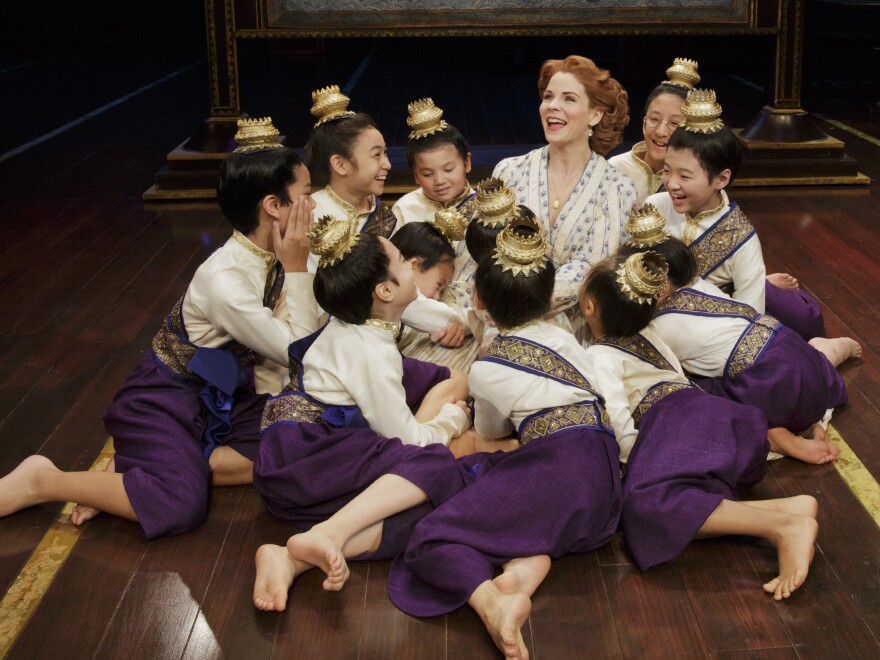 In the play, as in real life, Anna Leonowens (O'Hara) travels to Thailand to teach at the king's court, including his children.