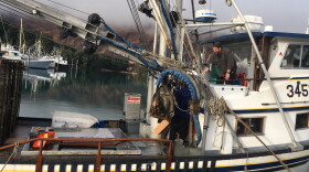 Jim Monroe speaks to crew member on the Lady Ashley. (Photo by Kayla Desroches / KMXT)