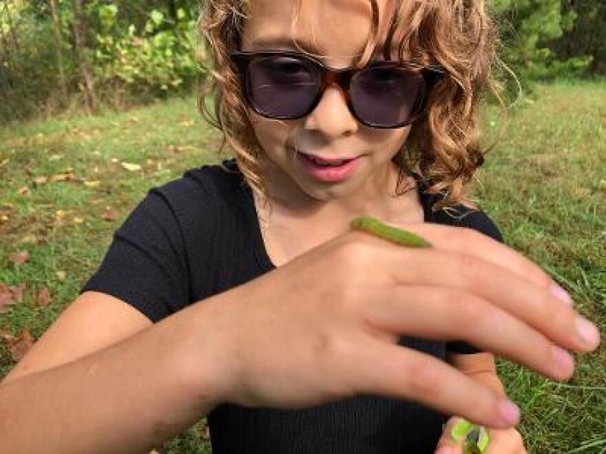 Lucy Schuyler celebrates Halloween with a friend on the Creepy, Crawly and Cute trail at Wildrock.