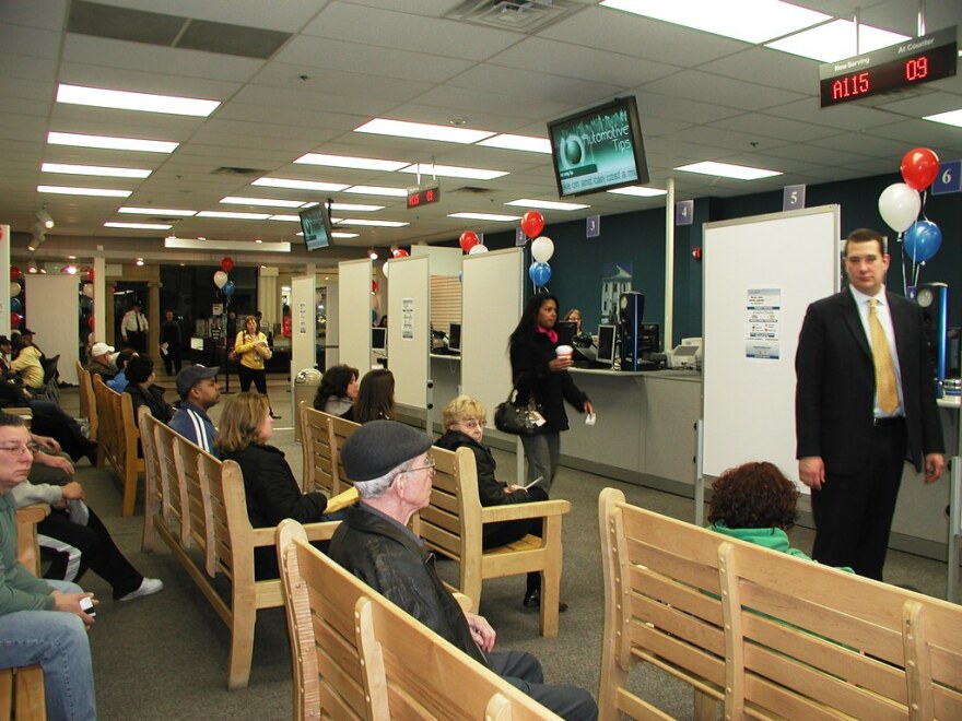  People waiting in line at the RMV at the Liberty Tree Mall in Danvers, Massachusetts.