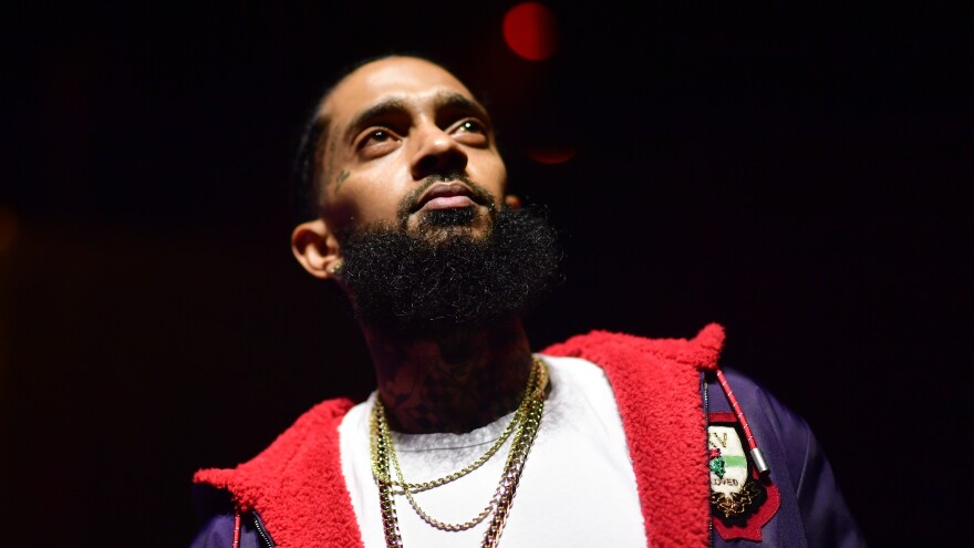 One year after his death, fans of Nipsey Hussle are honoring the rapper's legacy by turning his motivational words into actions.
