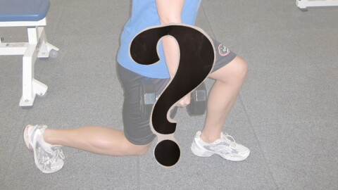 The bottom portion of an image of a person lunging with weights in hand; a question mark in the foreground