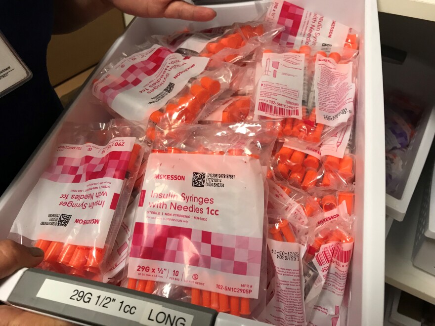 A box of insulin syringes.