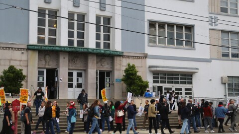 Teachers picket outside Washington High on November 12, 2025.
