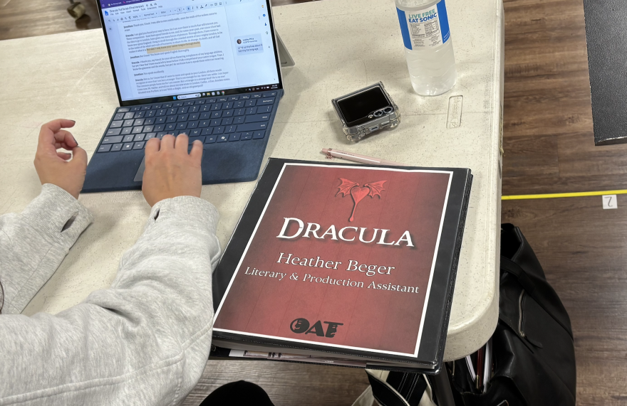 A production assistant takes notes as Ozark Actors Theatre prepares to stage a new version of "Dracula."