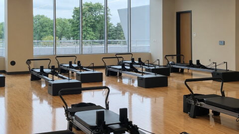 A room in MSU’s Student Recreation and Wellness Center features rows of reformers exclusively used for Reformer Pilates.
