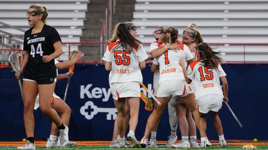 Syracuse celebrates a goal against Northwestern.