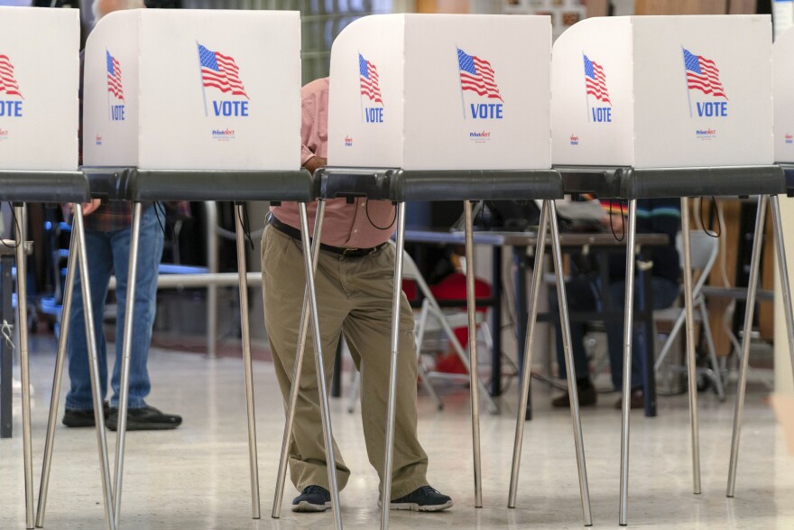 People cast their ballots during Election Day 2024 at John F. Kennedy High School in Silver Spring Md, on Tuesday, Nov. 5, 2024. (AP Photo/Jose Luis Magana)