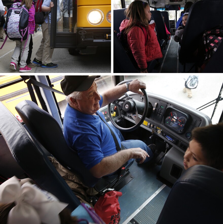 Kids board the bus.