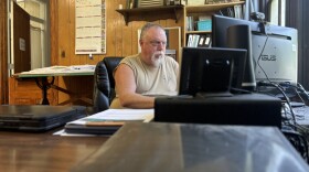 Berger City Clerk Jason Eaklor sits at his desk in Berger City Hall on July 22, 2025. Eaklor, a contractor and then-alderman, toured the Berger warehouse around the time of the hazardous material shipments. He said that at that time, he had heard nothing about the nature of the material inside the building.