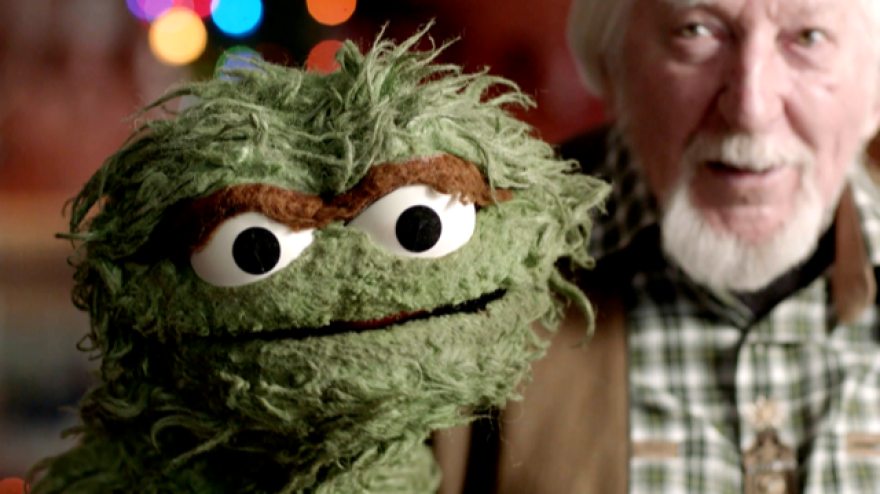 Carroll Spinney and Oscar The Grouch.