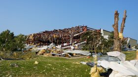 Debris surrounded a damaged warehouse in the aftermath of a tornado that tore through Appleton, Wis., Tuesday, July 28, 2026. (AP Photo/Kayla Wolf)