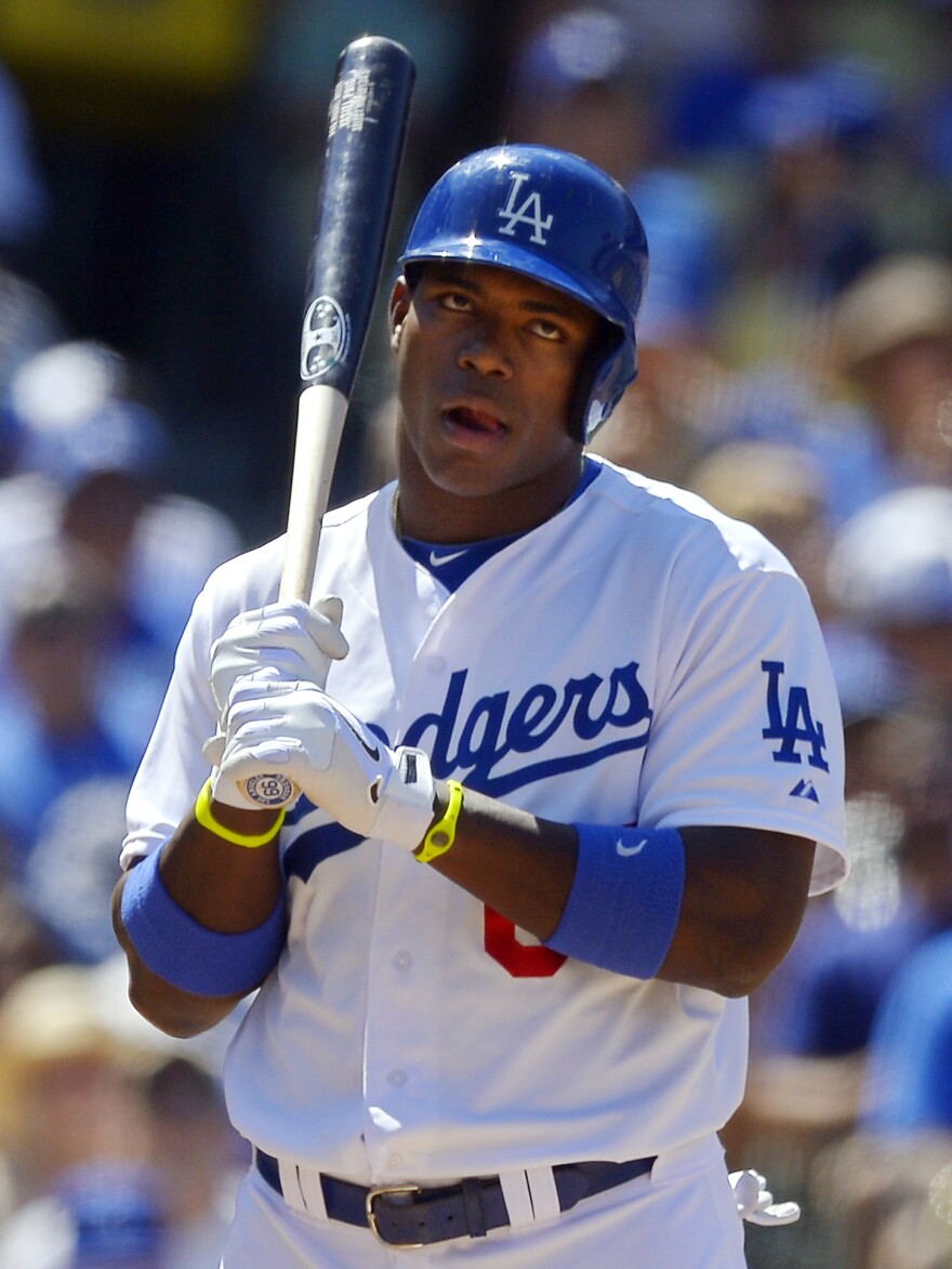 Puig reacts to being intentionally walked during the fifth inning of a game against the Tampa Bay Rays on Aug. 10, in Los Angeles.