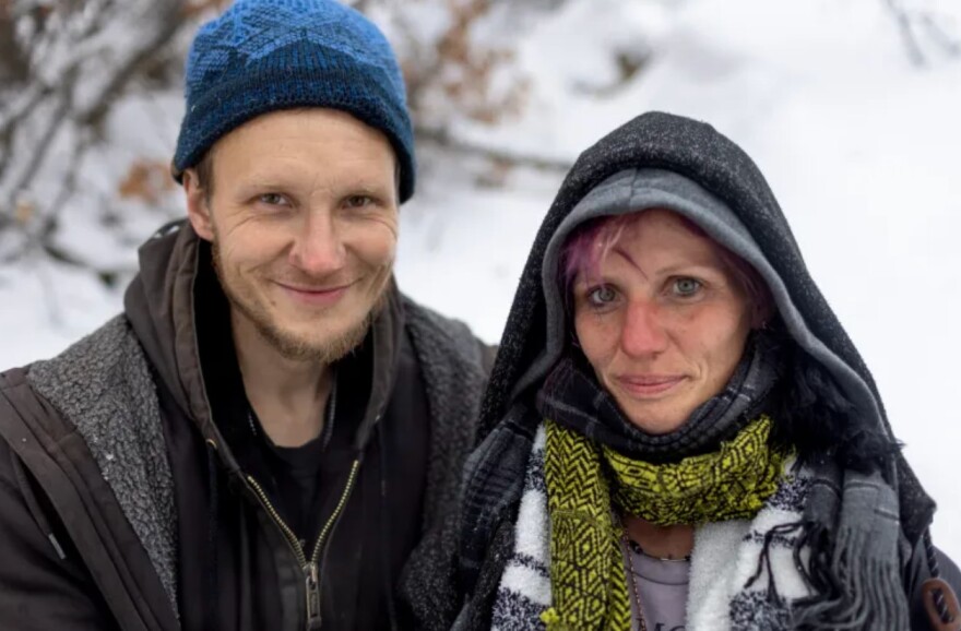 Thad Newhouse, left, and Moriah Herndon have been living outside the city since the encampment closed in the fall of 2022.